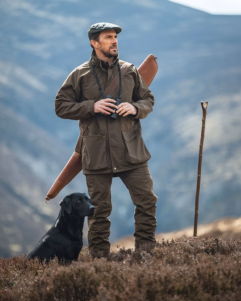Hoggs of Fife Ballater Waterproof Field Jacket in Green, field lifestyle view