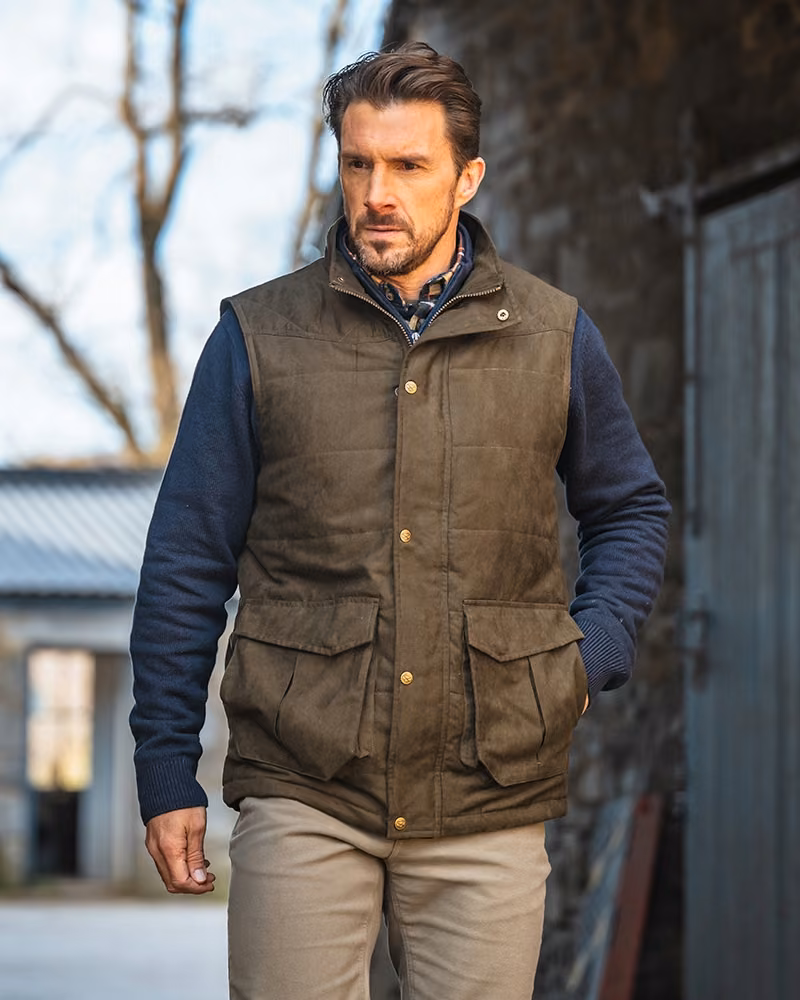 Hoggs of Fife Glenbervie Quilted Gilet in Loden, lifestyle view
